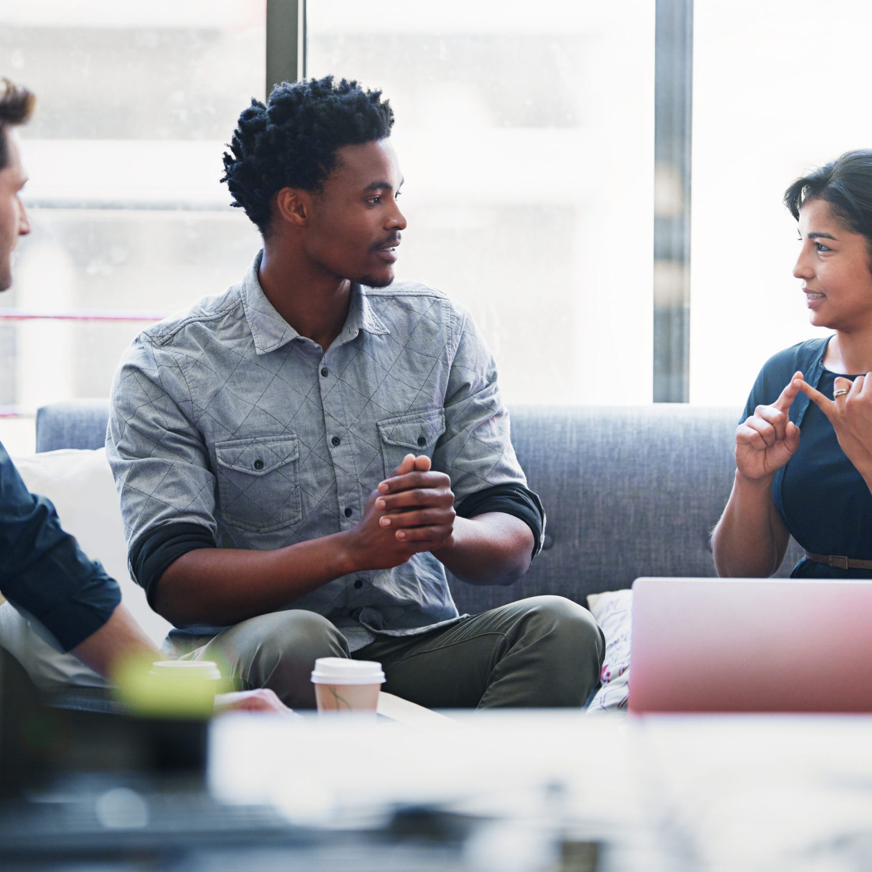 Planning, teamwork and mentor with business people in meeting for strategy, project management or creative. Entrepreneur, brainstorming and diversity with employee in startup for design collaboration.