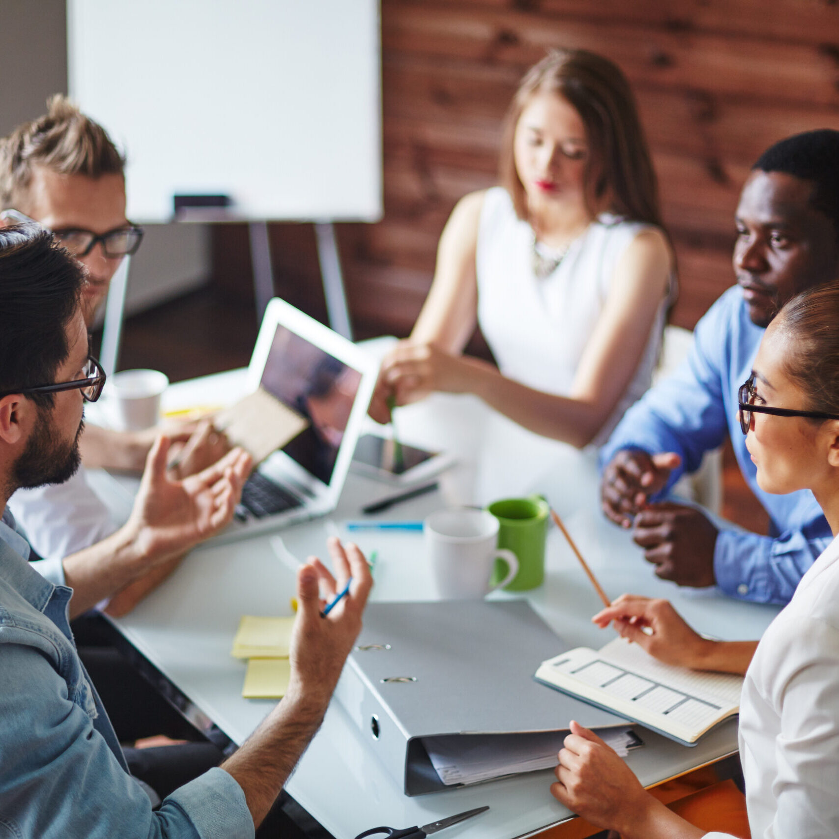 Group of multi-ethnic business partners discussing ideas